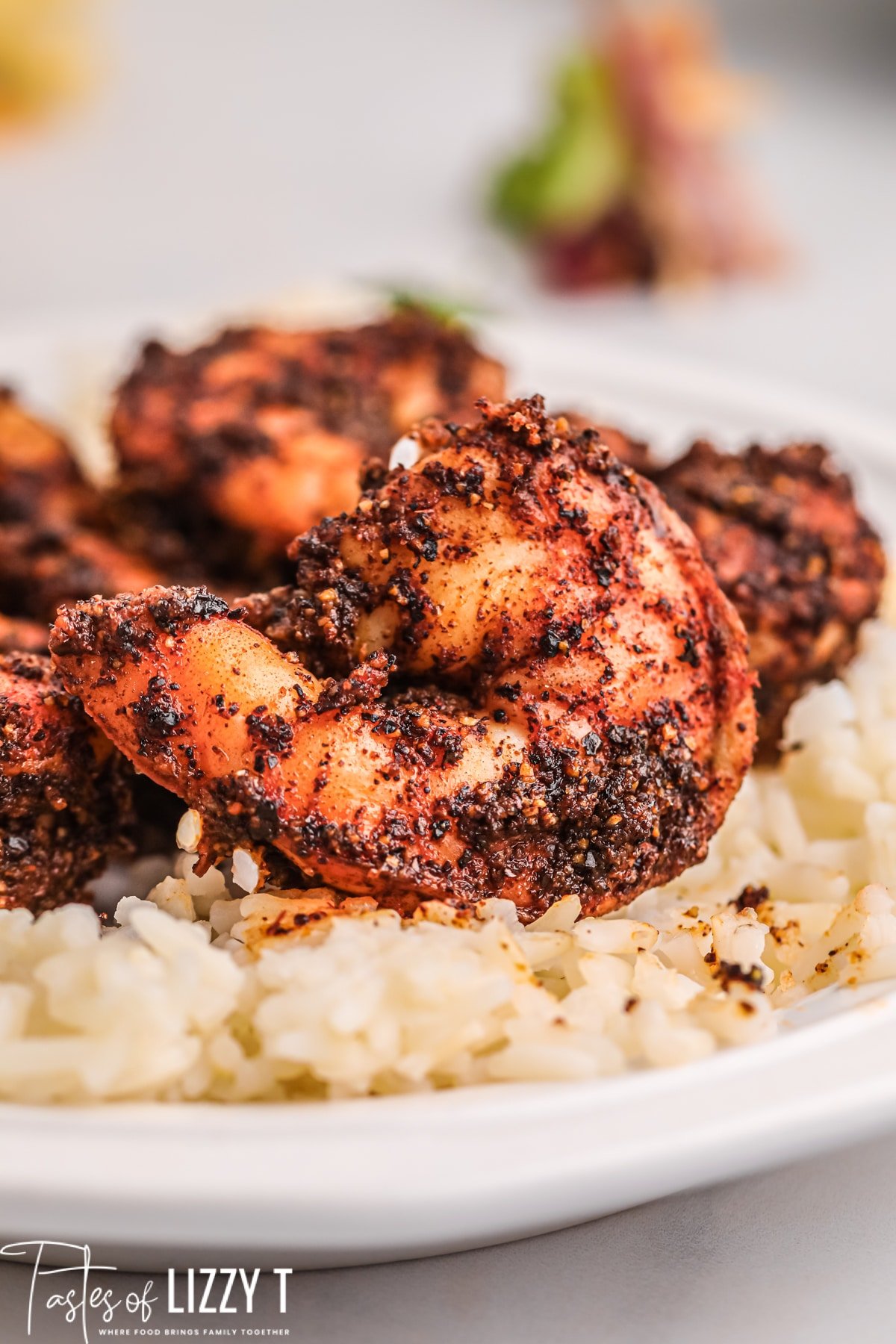 plate with blackened shrimp and rice